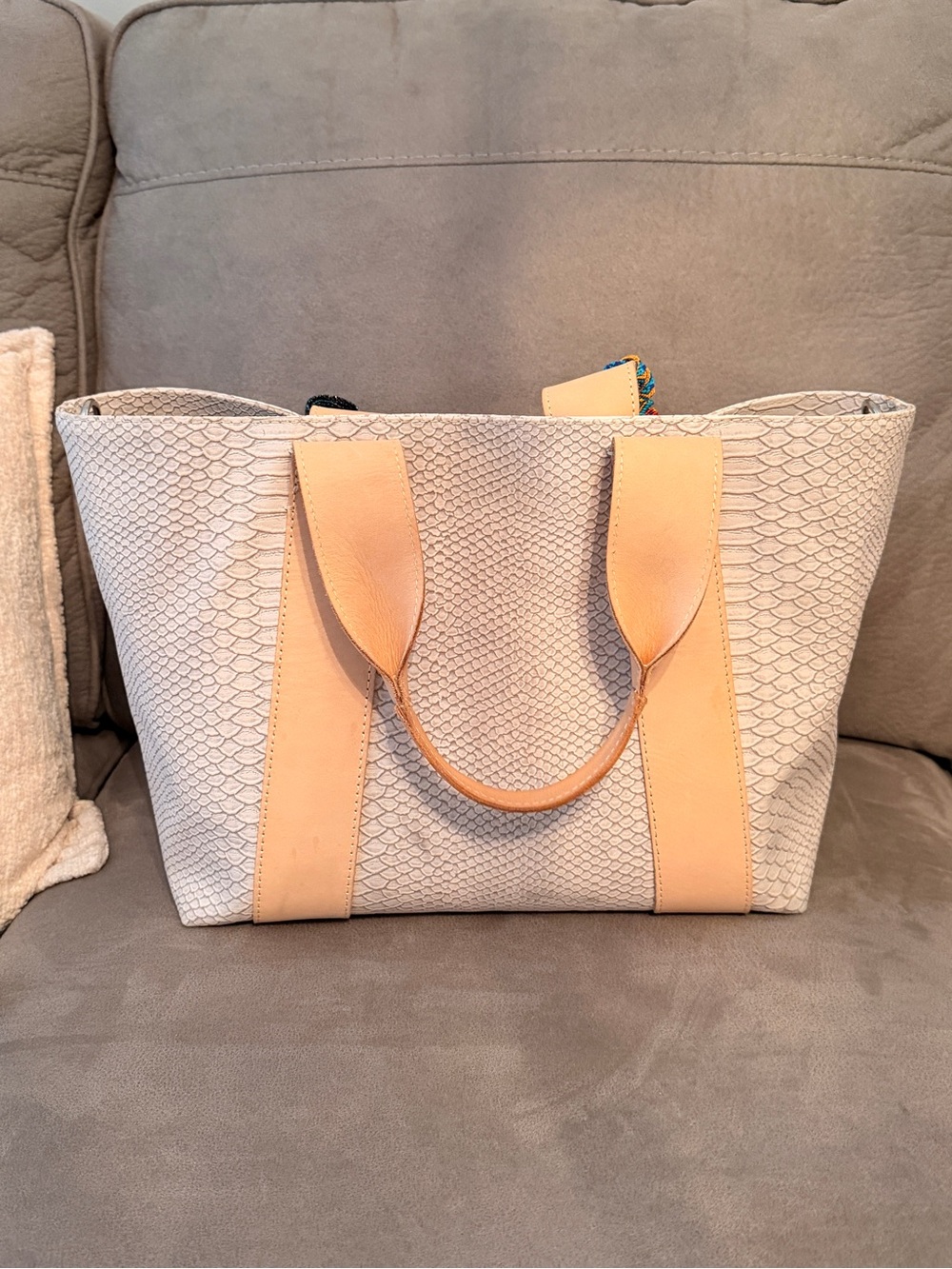 Consuela Thunderbird Carryall Cream Textured Tote with Tan Straps and Red Tassel - Picture 3 of 5